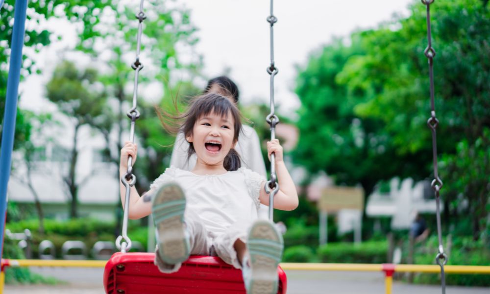 Swinging into Development: How Toddler Swings Boost Physical, Cognitive, and Social Growth
